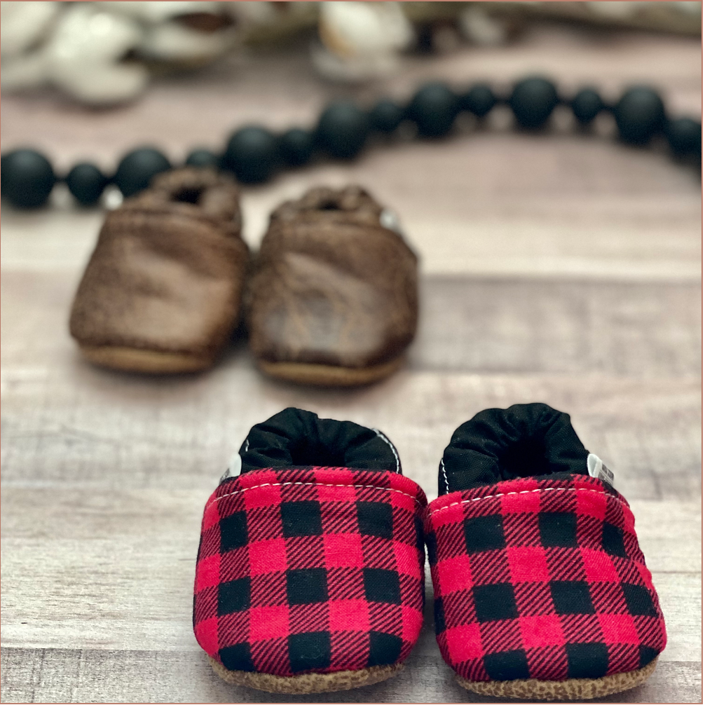 Baby moccasin shoes in red and black plaid