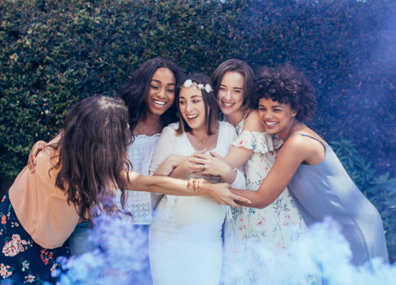 A group of women hugging