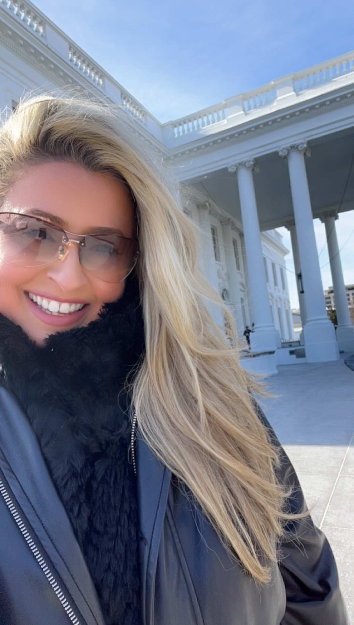 Make up artist Nicole Bryl posing in front of the White House