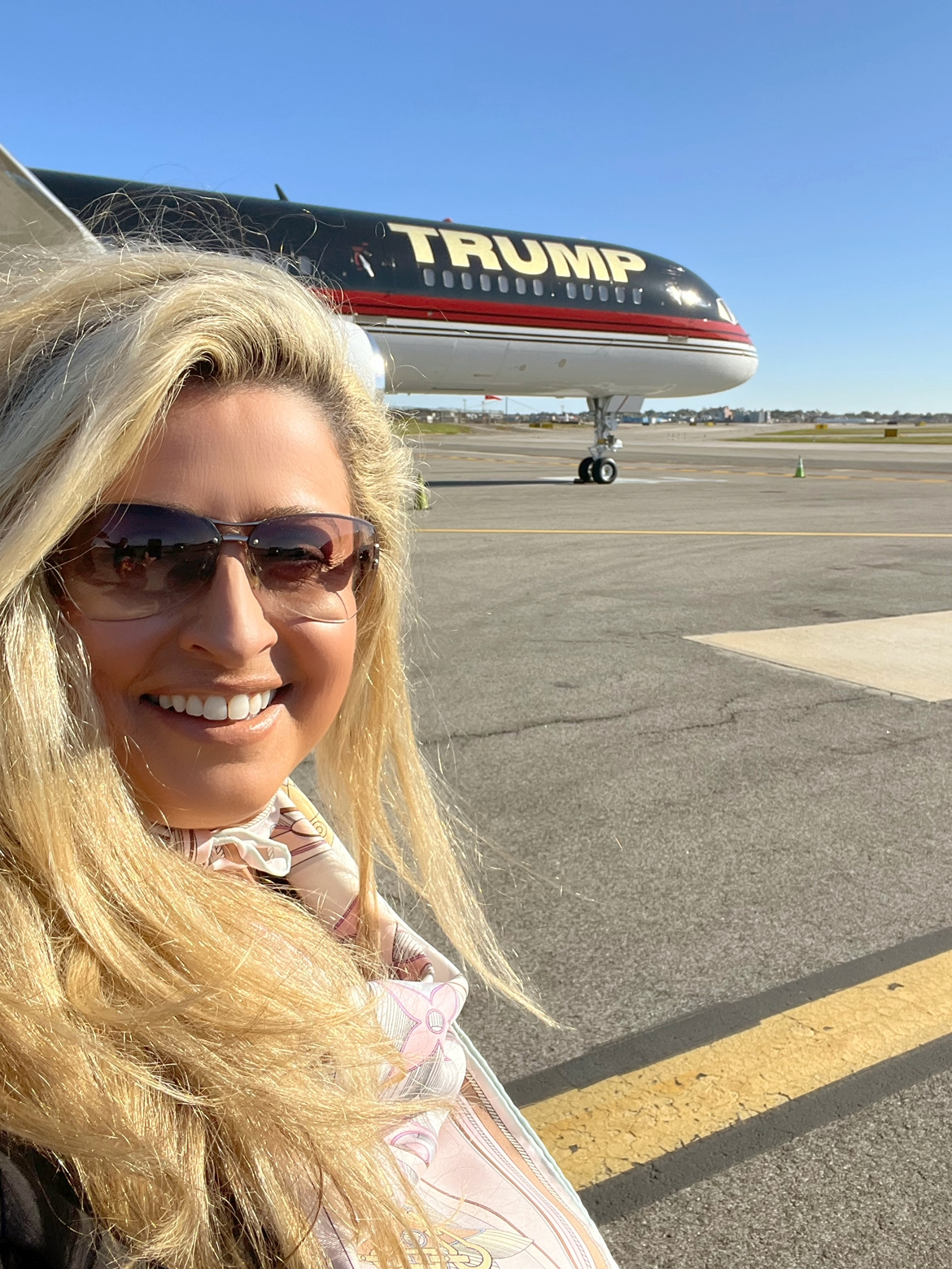 Make up artist Nicole Bryl in front of Air Force One